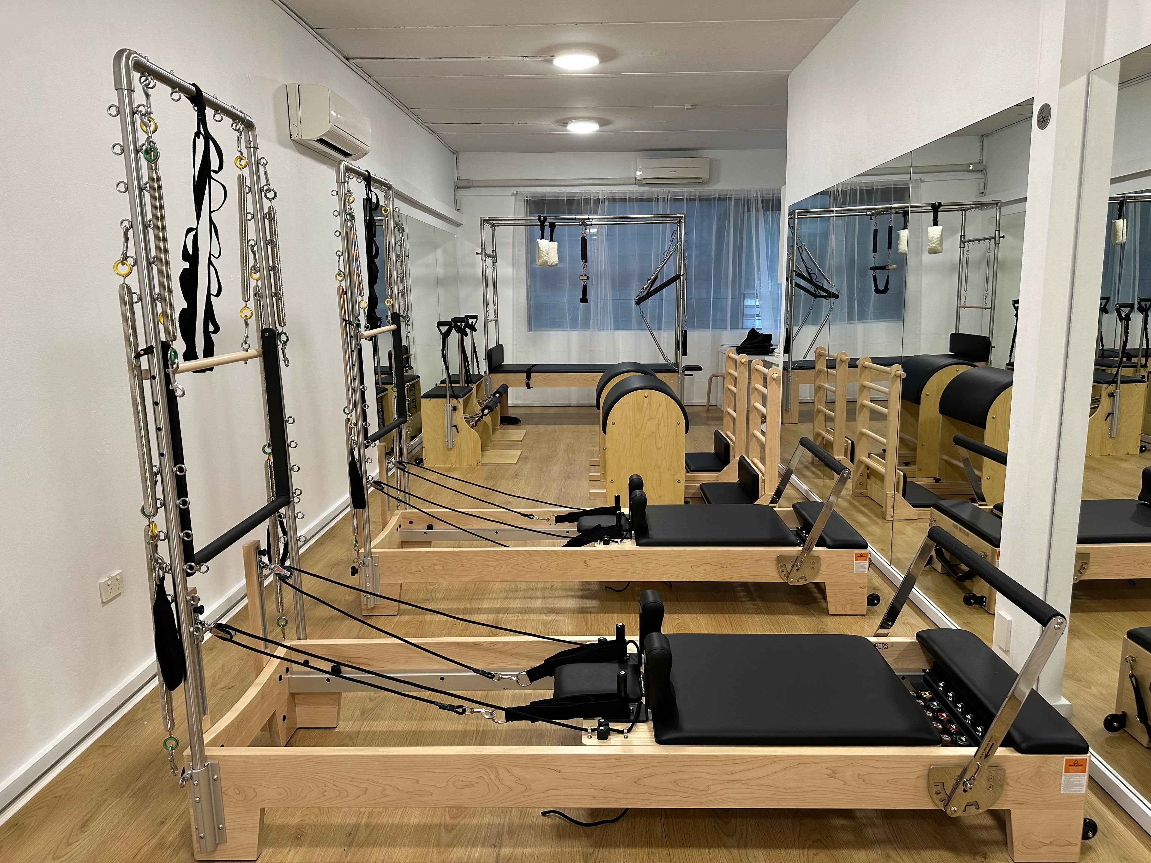 Half Trapeze Reformer | Motion Pilates