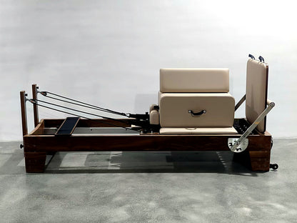 Motion Pilates | Walnut Studio Reformer