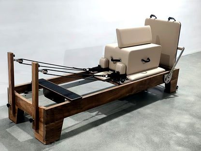 Motion Pilates | Walnut Studio Reformer